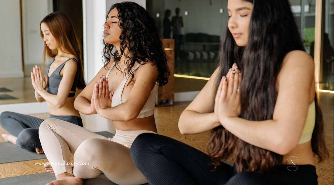 Women in class meditating