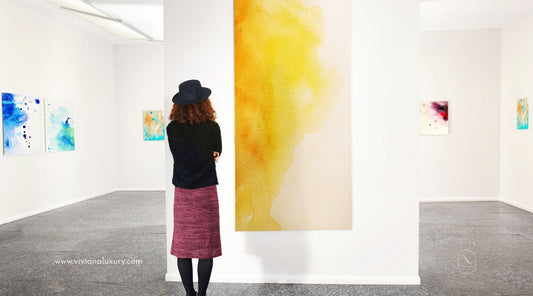 Woman looking at art