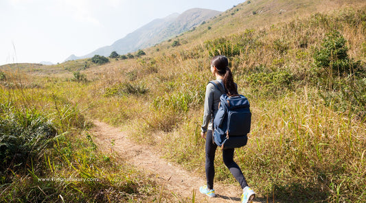 Woman walking in nature for calm and wellness