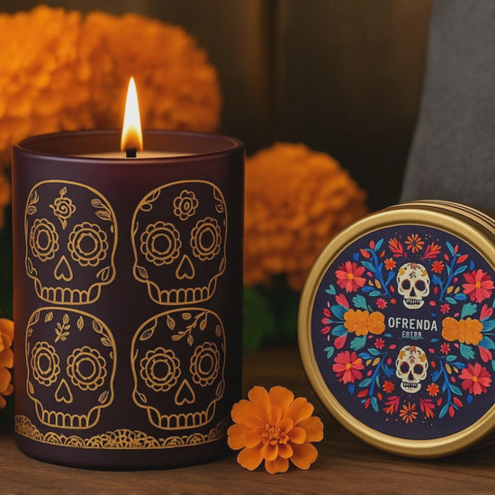 Ofrenda Día de los Muertos candle in glass tumbler and travel tin.
